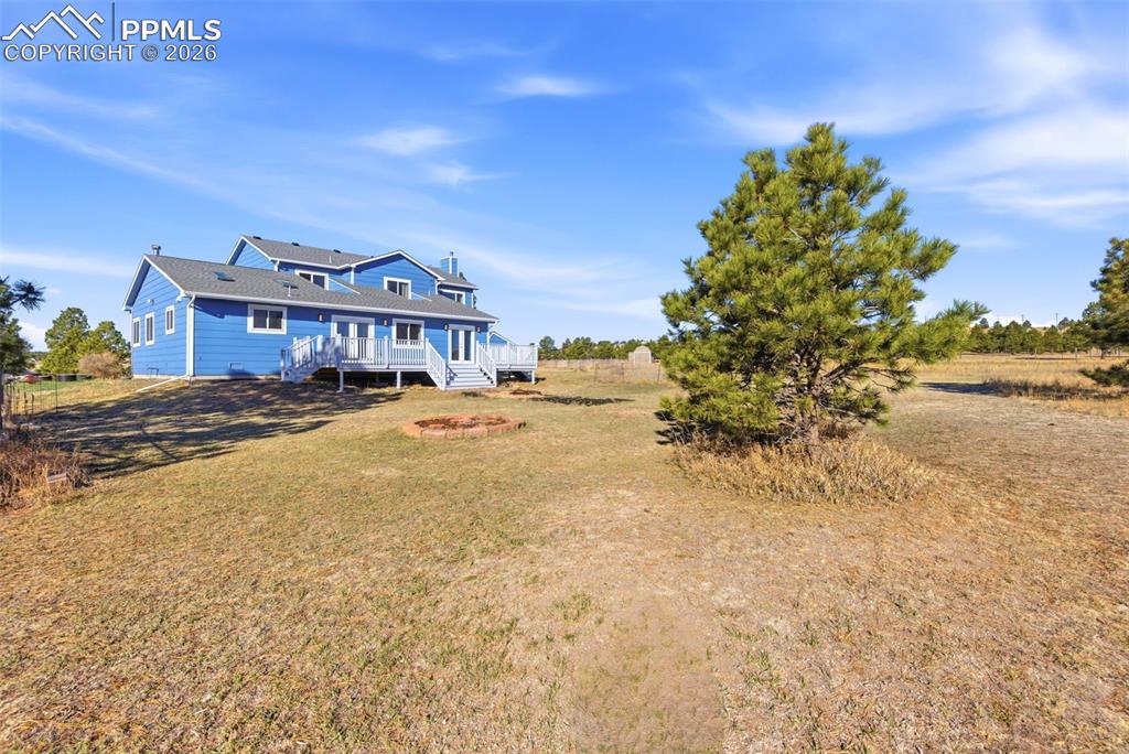 Image 44 of 50: Rear view of house with a view of countryside