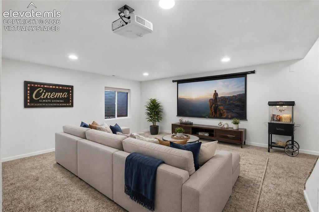 Image 35 of 50: Virtually staged Basement gathering area with Recessed ceiling lighting, ce