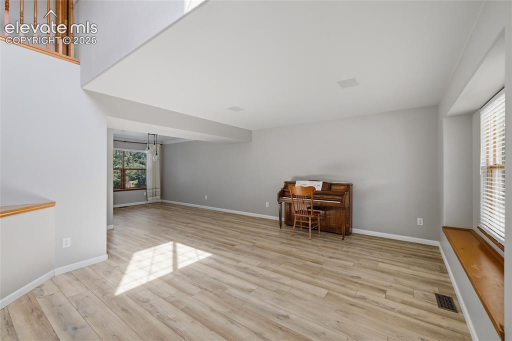Image 5 of 50: With lvp flooring and large front window