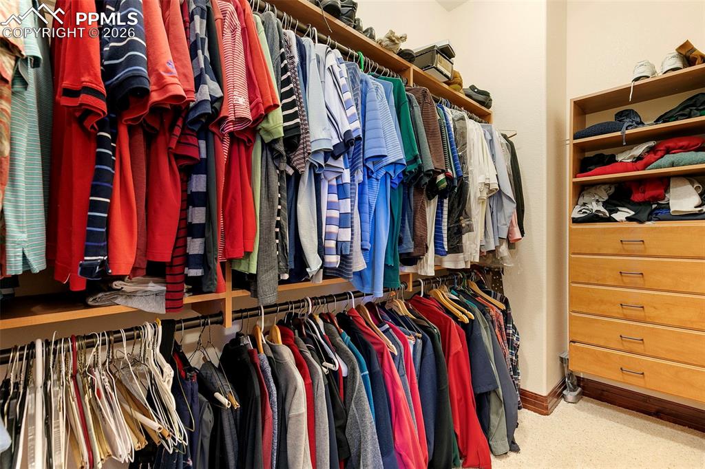 Image 28 of 43: Primary bedroom closet
