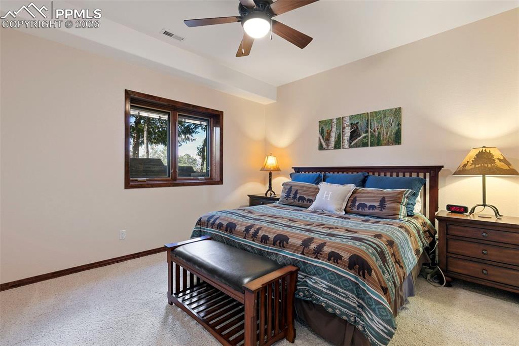 Image 38 of 43: bedroom shares a Jack-N-Jill bath
