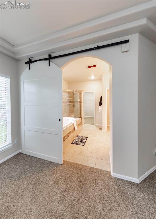 Image 24 of 43: Entry to bathroom