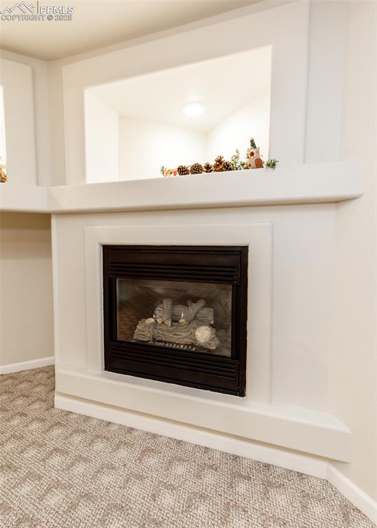 Image 34 of 43: Fireplace in Family Room