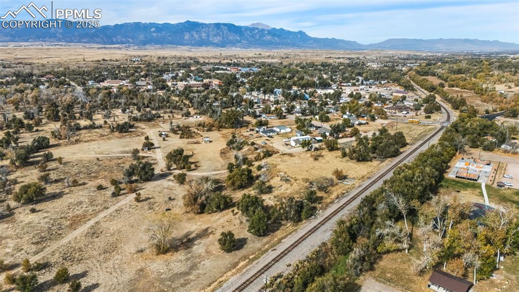 Caption: Aerial view of property and surrounding area with rural landscape