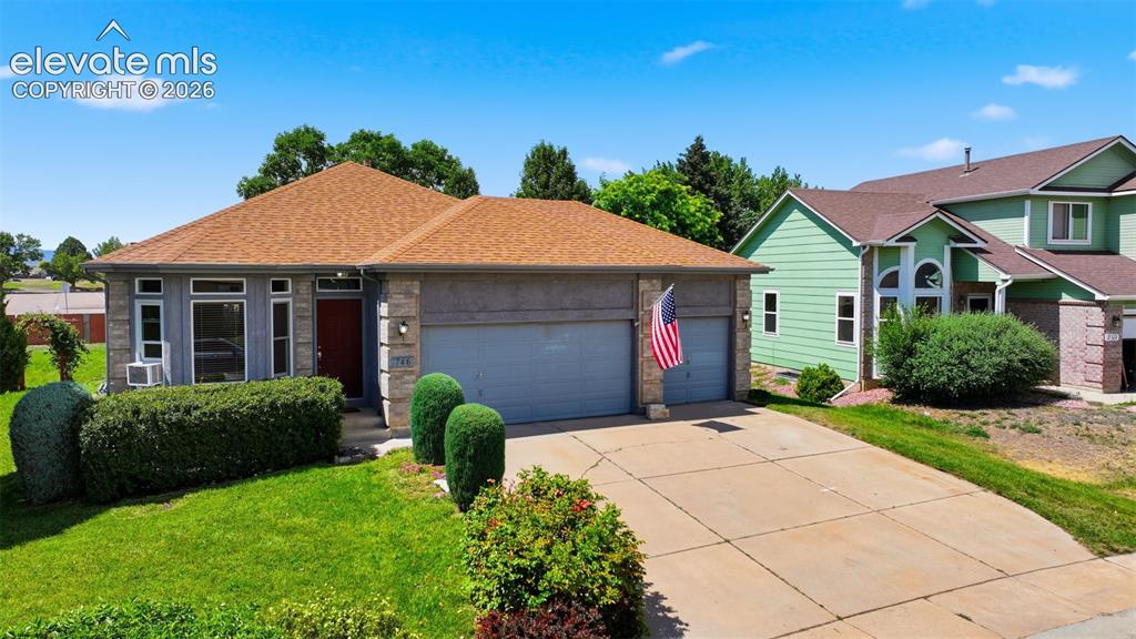 Image 1 of 31: Beautiful brick and stucco home with three car garage!
