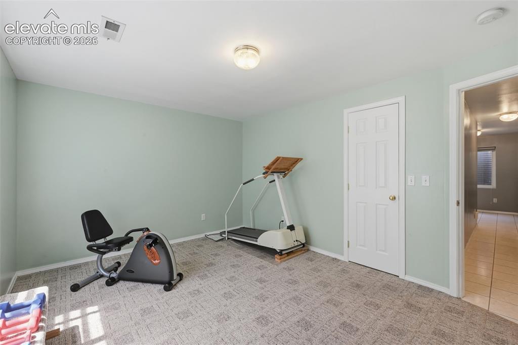 Image 21 of 31: Another view of the third bedroom showing the walk in closet!