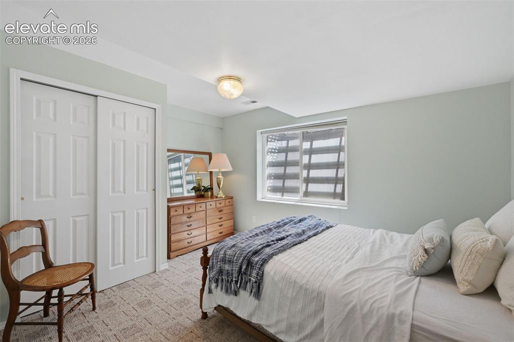 Image 22 of 31: Fourth bedroom is also in the basement!