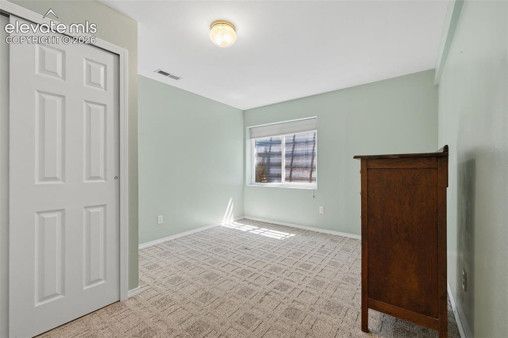 Image 25 of 31: Fifth bedroom in the basement!