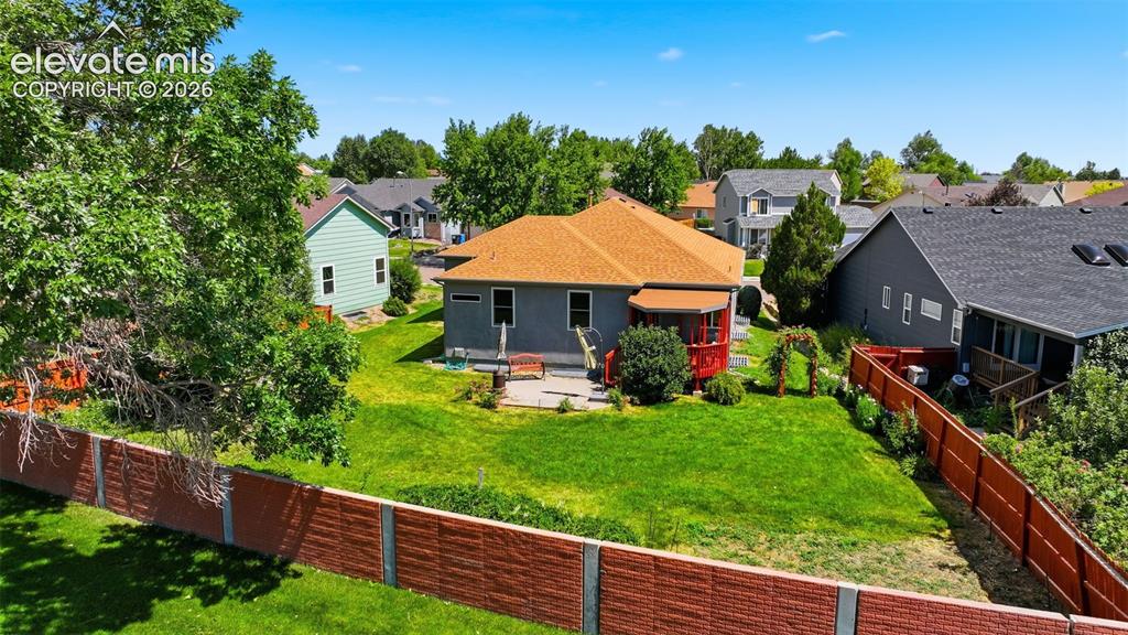 Image 4 of 31: Beautiful private back yard and covered deck!