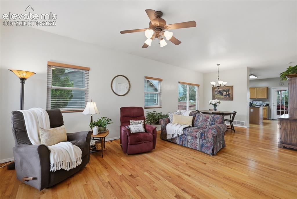 Image 6 of 31: Gorgeous wood flooring through the main leiving areas!