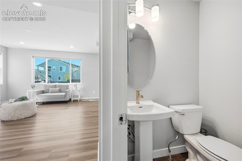 Image 20 of 49: 1/2 bath on the main for guests