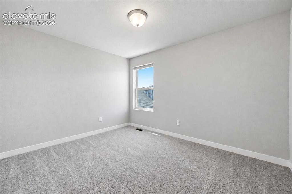 Image 23 of 49: Upstairs secondary bedroom 2