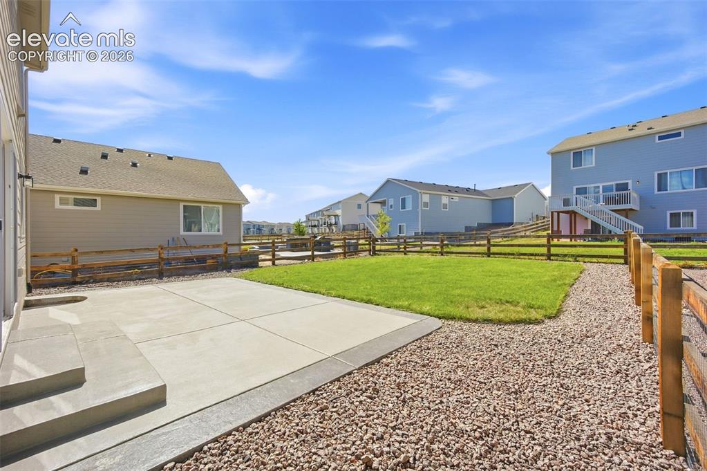 Image 46 of 49: fully landscaped with auto sprinkler
