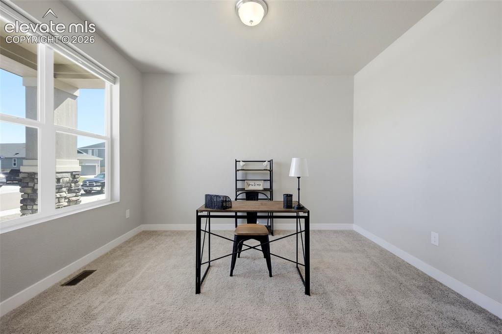 Image 5 of 49: Flex space can be an office, formal dining, sitting room, or converted into