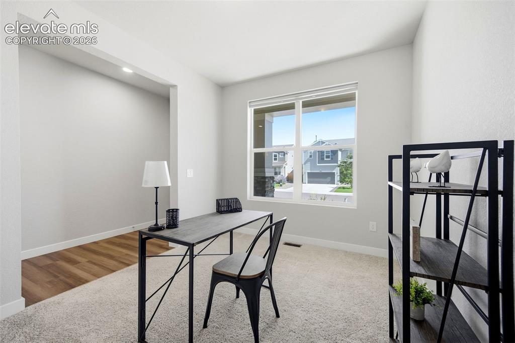Image 6 of 49: Flex space can be an office, formal dining, sitting room, or converted into