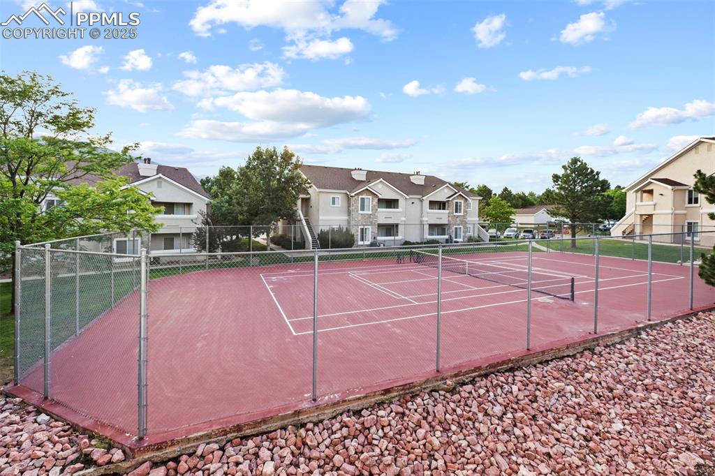Image 43 of 43: Tennis courts right outside the unit