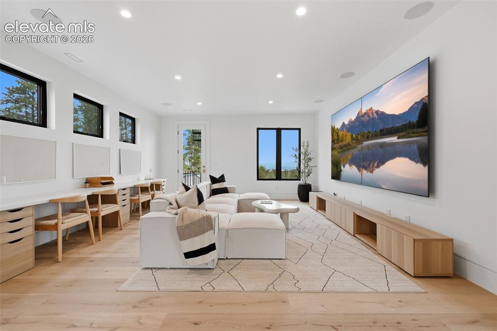 Image 31 of 50: Rec room/family room over the garage