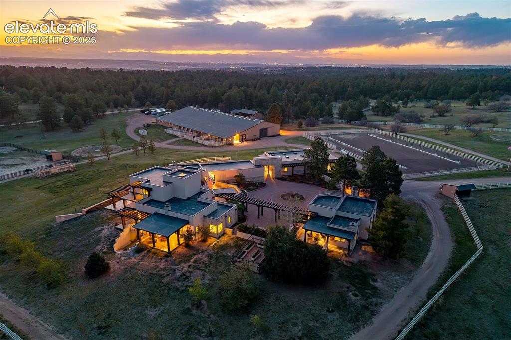 Image 1 of 46: Forty acres of serene equestrian paradise with lush pastures, immaculate wh