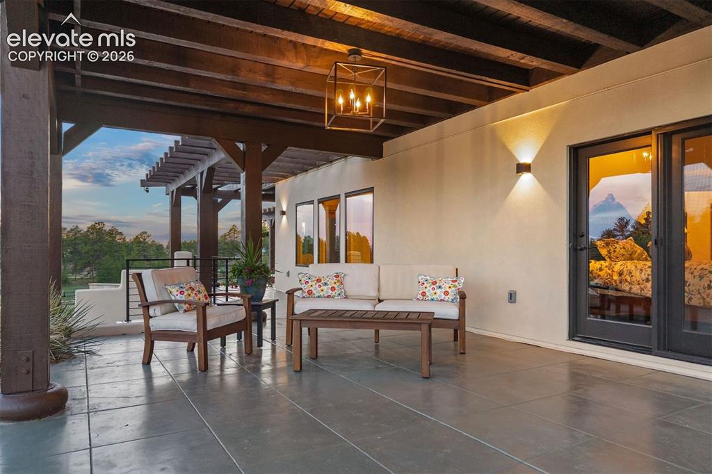 Image 22 of 46: Private patio off the primary suite.