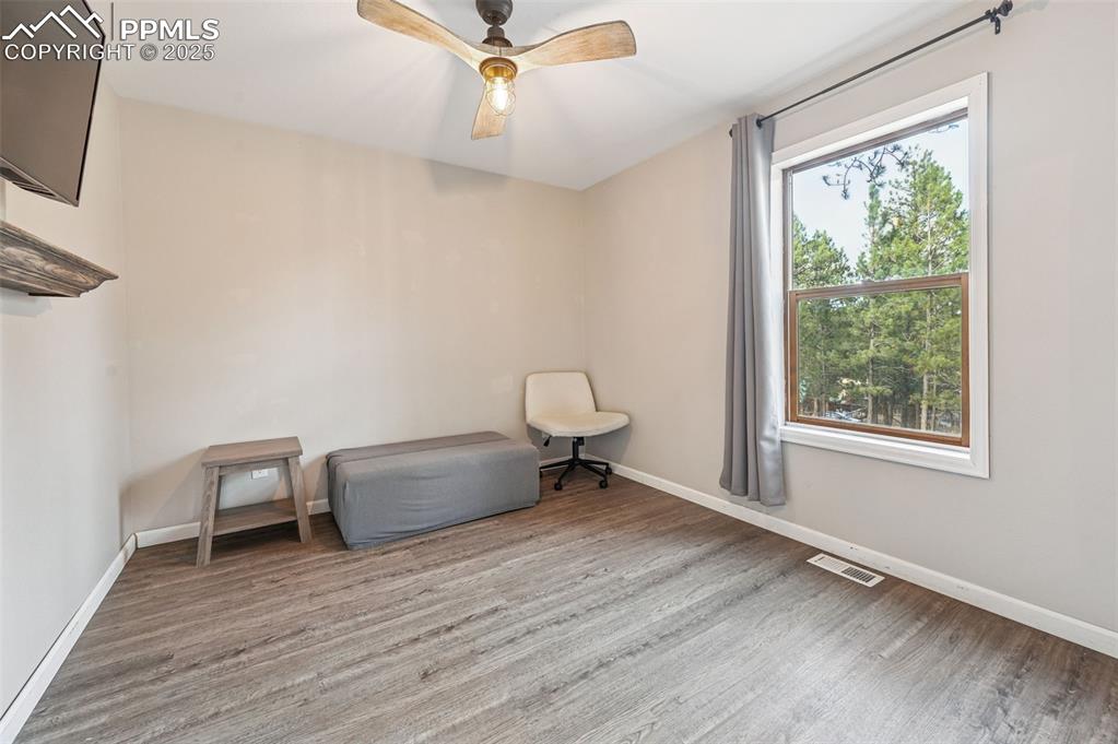 Image 26 of 35: Main level bedroom