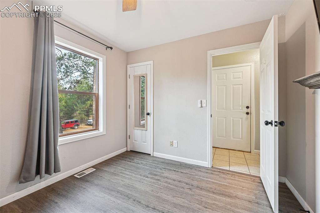 Image 27 of 35: Main level bedroom