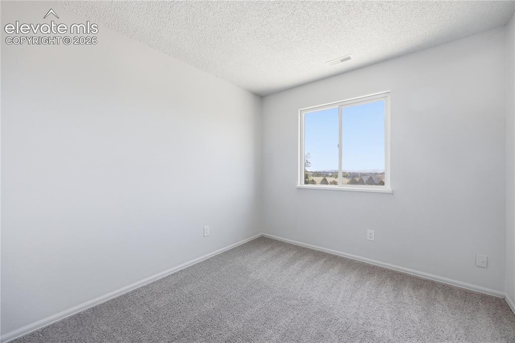 Image 19 of 37: Bedroom