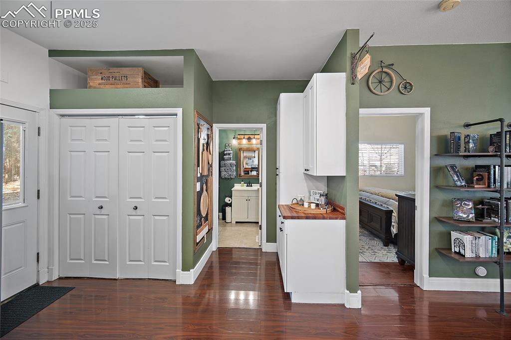 Image 16 of 36: Kitchen featuring appliances with stainless steel finishes, butcher block c