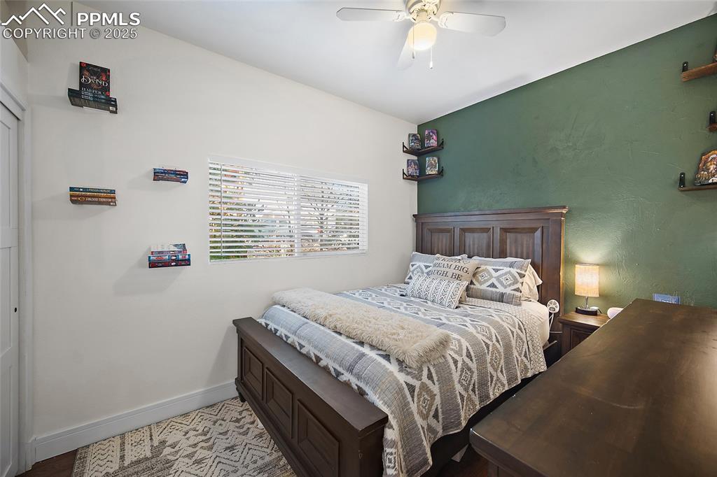 Image 25 of 36: Full bathroom featuring shower / bathtub combination with curtain, vanity,