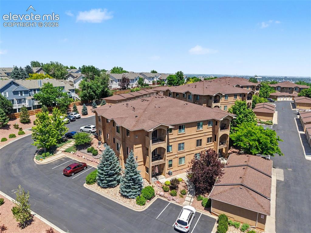 Image 2 of 34: Unit has a detached garage; there is also plenty of parking for additional