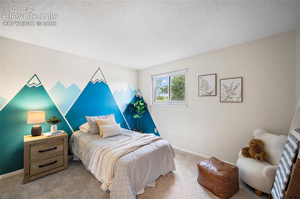 Image 11 of 34: Secondary Bedroom