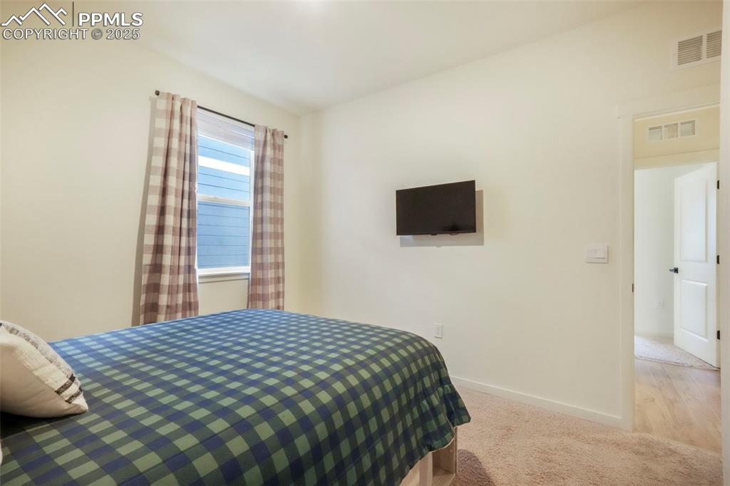 Image 13 of 50: Bedroom