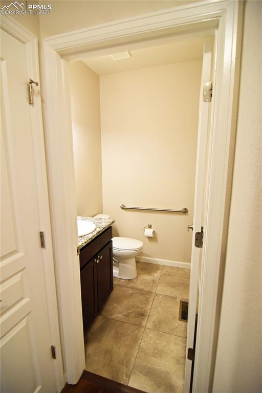 Image 13 of 29: Powder room on main level!