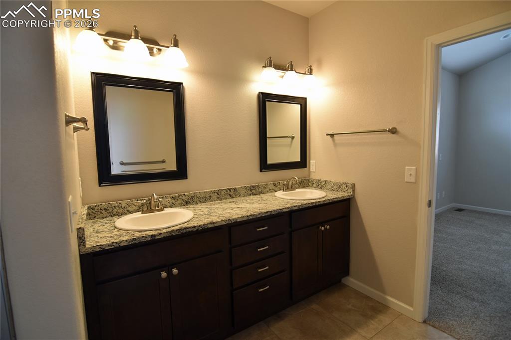 Image 18 of 29: Twin vanities!