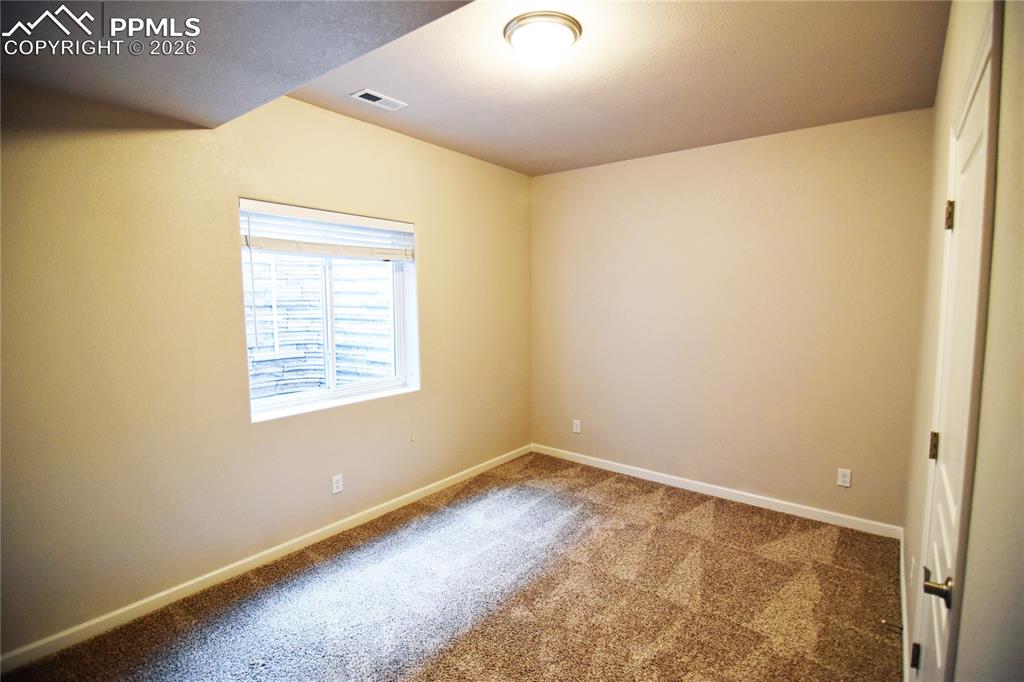 Image 27 of 29: Basement bedroom 2