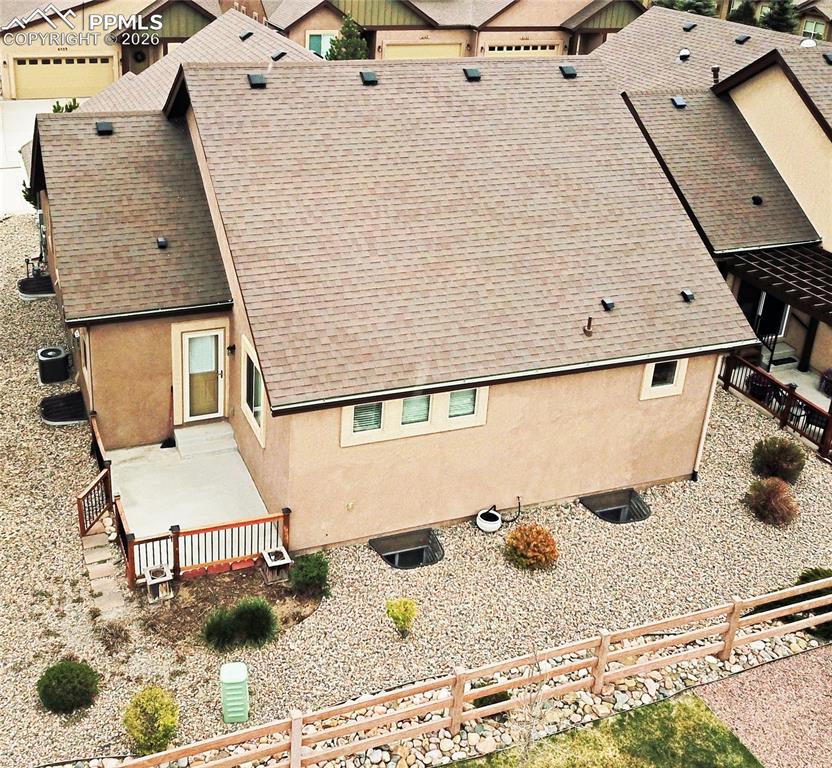 Image 4 of 29: Back of house with patio
