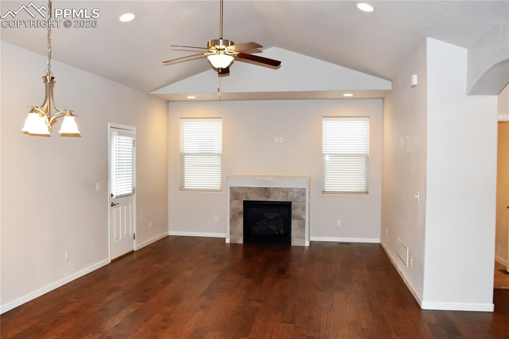 Image 7 of 29: Gas fireplace and walkout to patio!