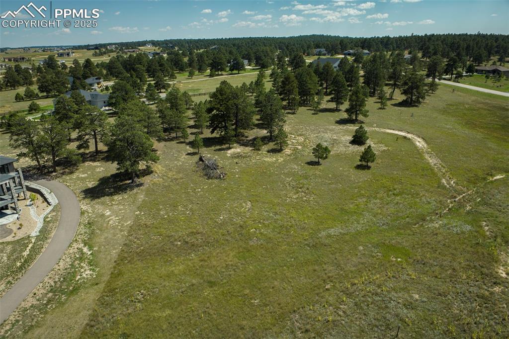 Image 10 of 16: Aerial view of property and surrounding area