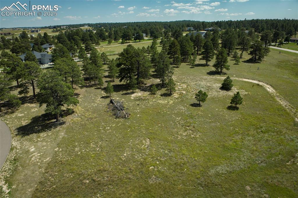 Image 11 of 16: Aerial view of property and surrounding area