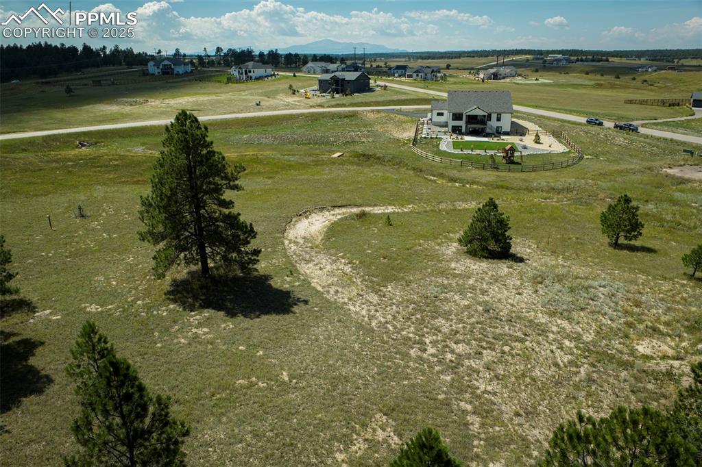 Image 15 of 16: View of rural area with mountains