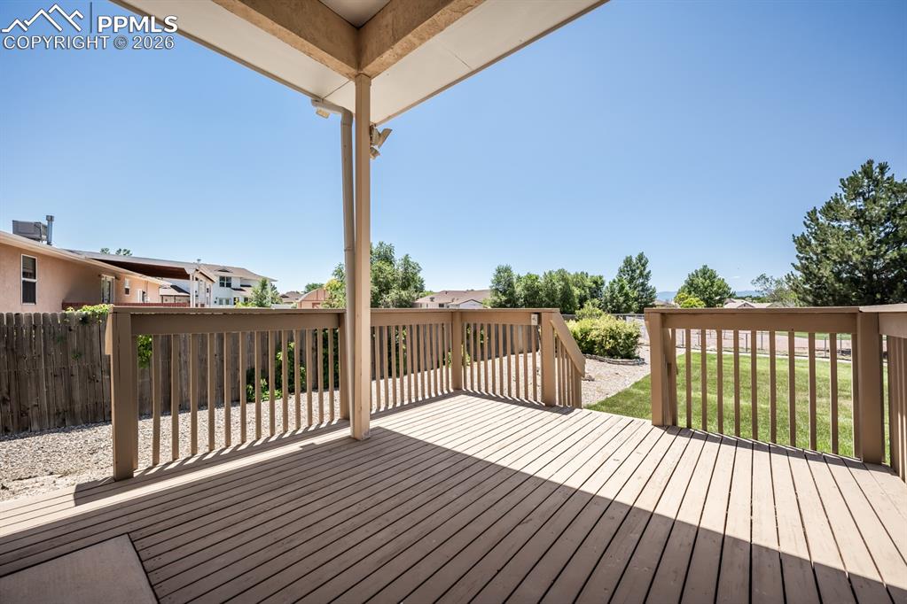 Image 33 of 38: Deck featuring a residential view
