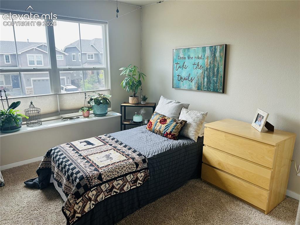 Image 15 of 22: 3rd bedroom on upper level