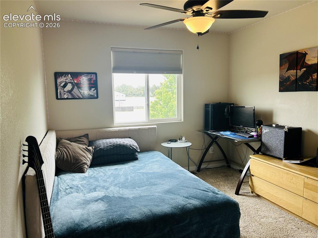 Image 16 of 22: Fourth bedroom on upper level 