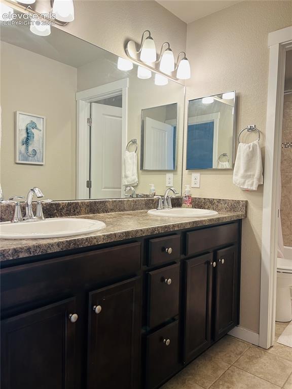 Image 17 of 22: Second full bathroom on upper level 