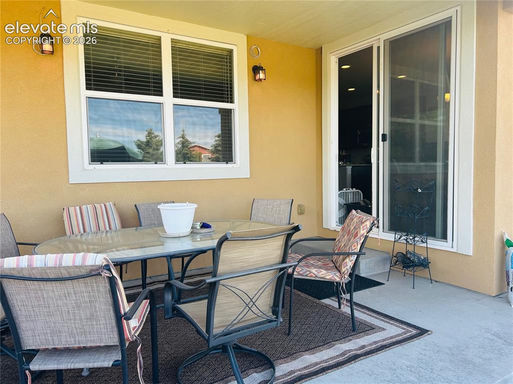 Image 21 of 22: Covered porch is lovely 