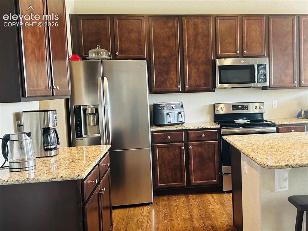 Image 6 of 22: Modern stainless steel appliances