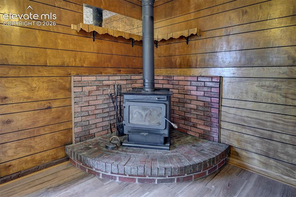 Image 21 of 40: Wood stove