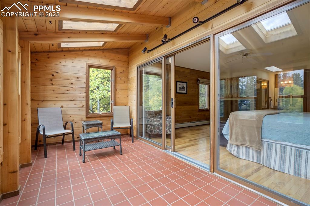 Image 18 of 49: Sun Room