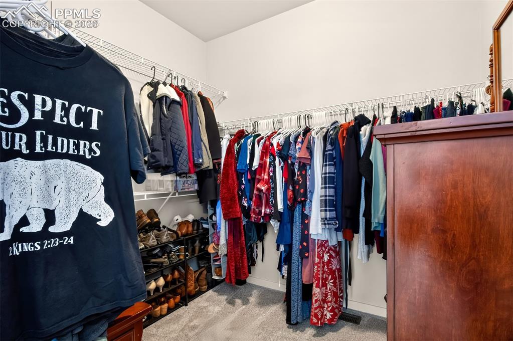 Image 20 of 40: Walk-in closet in Primary Bedroom