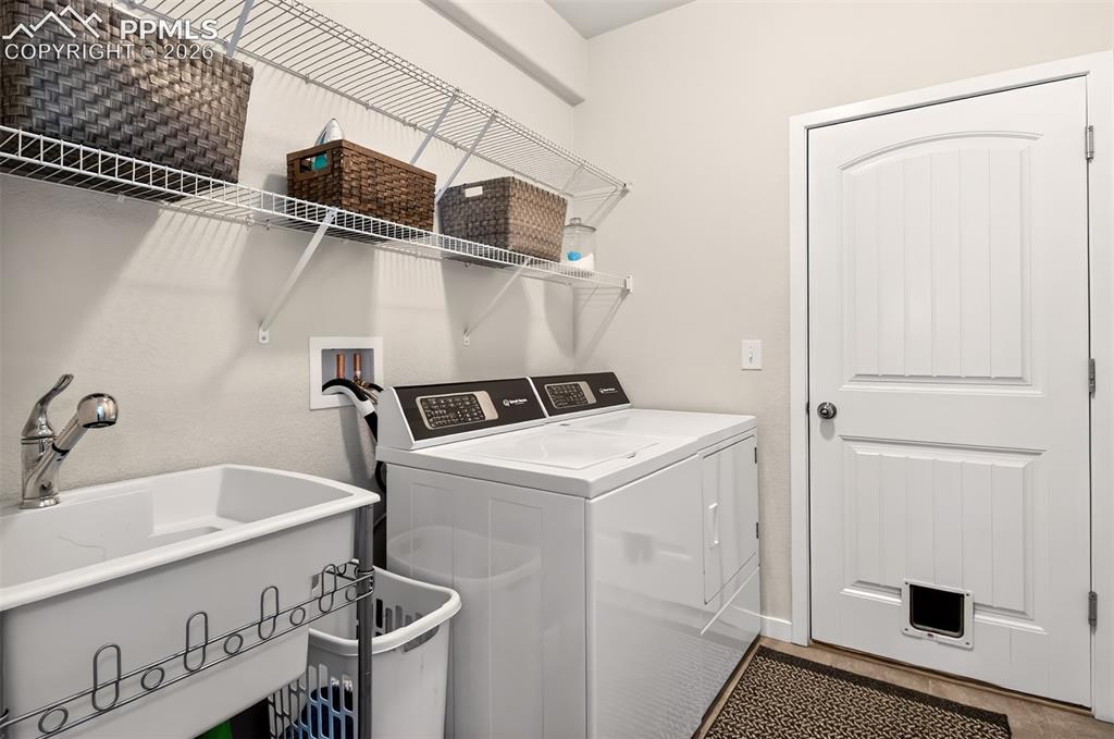 Image 21 of 40: Main level laundry