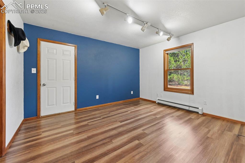 Image 10 of 49: Solid Counter Tops/Pantry Closet and Stainless Steel Appliances